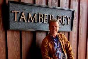 Morgan in front of Tamber Bey sign
