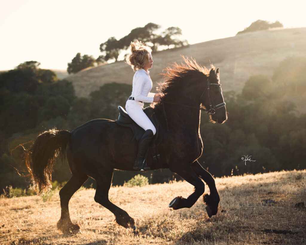 Jennifer on horseback, in moment of suspension