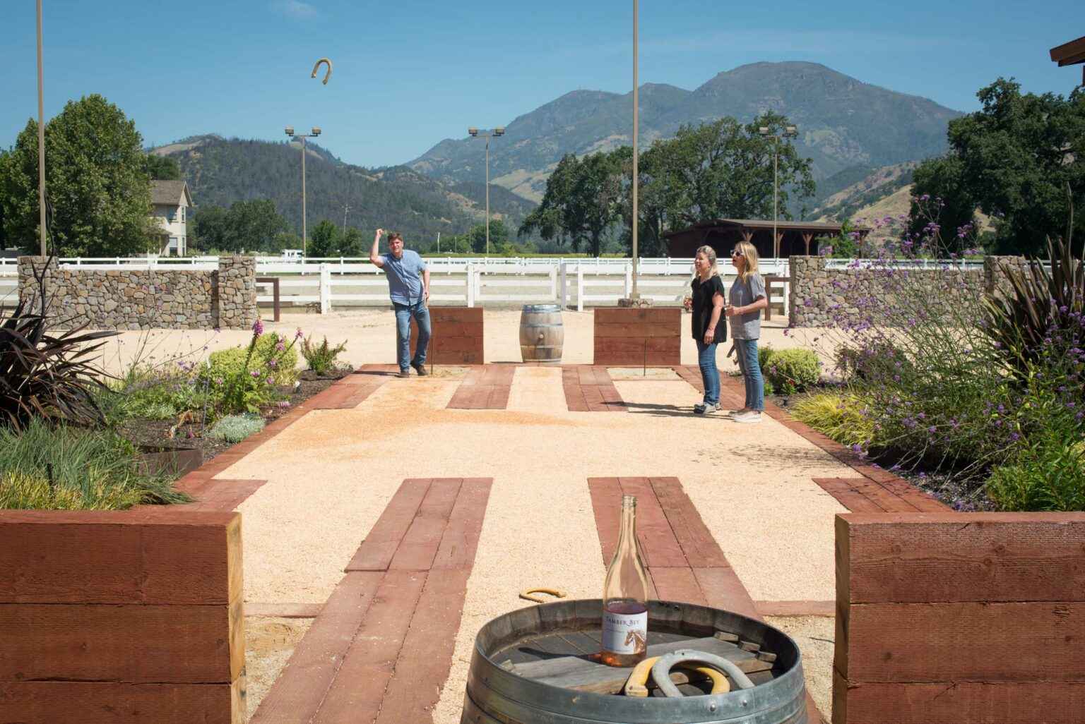 a couple of people that are standing in the dirt.