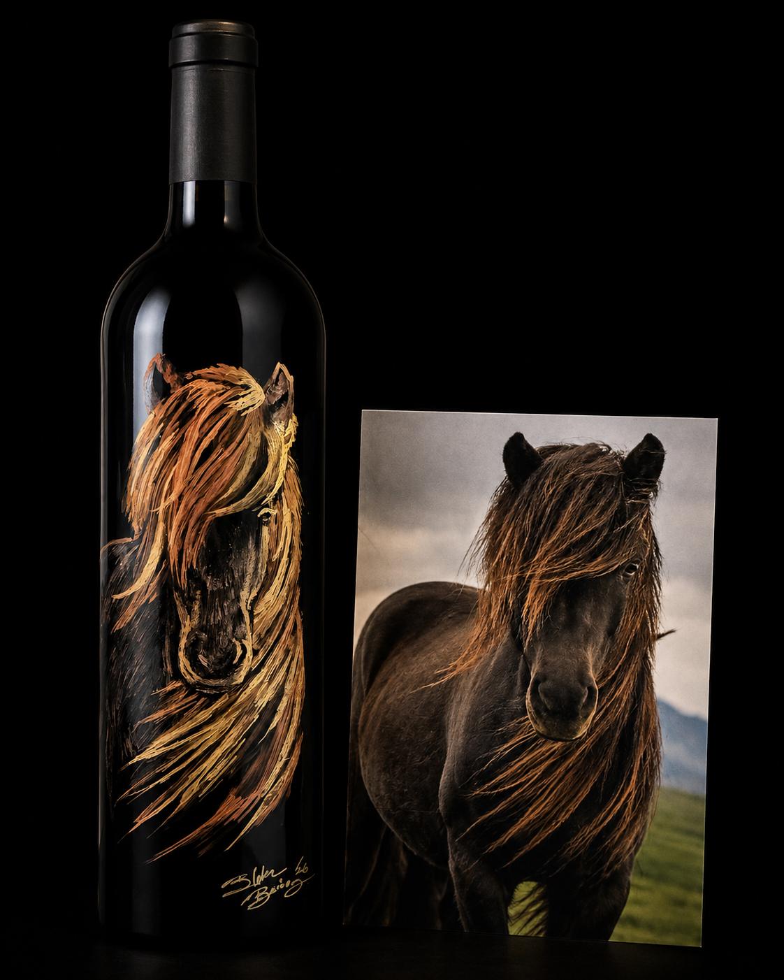 A hand-painted Tamber Bey magnum beside the photograph of the horse it was painted from.